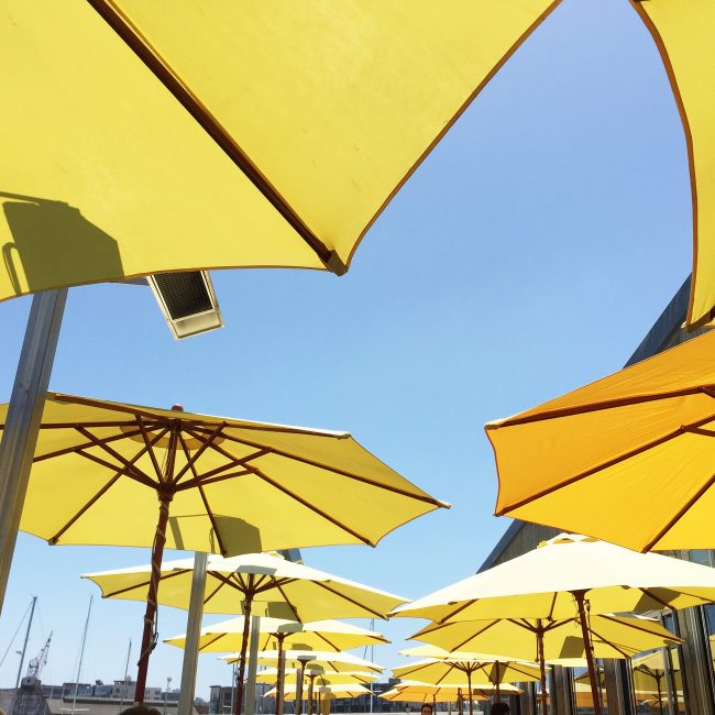 Yellow umbrellas at Mission Rock Resort in SF